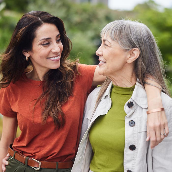 mother and daughter smiling
