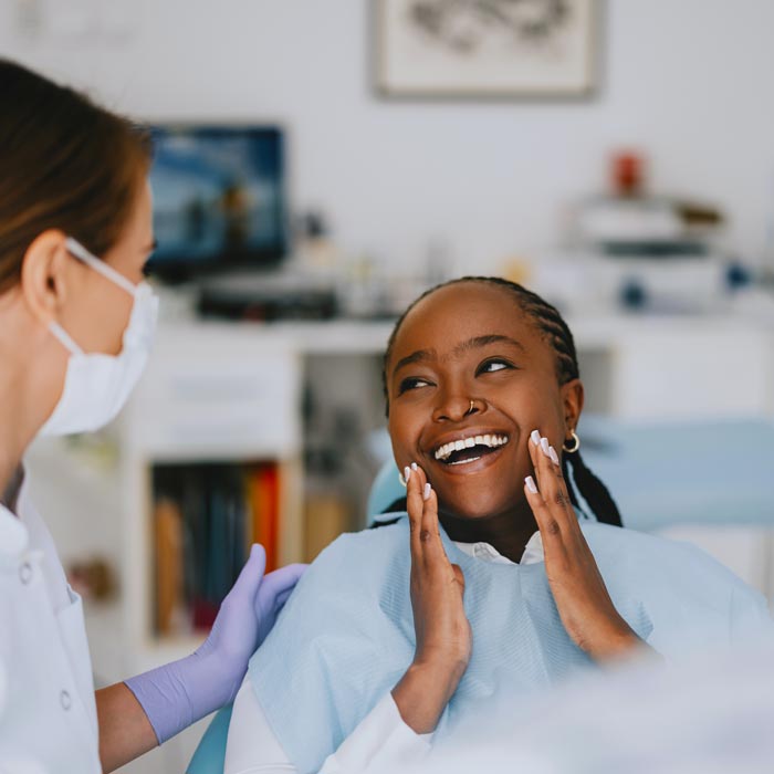 woman smiling in dental chair
